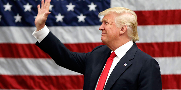 Republican presidential candidate Donald Trump arrives to speak at a campaign rally in Akron, Ohio,...