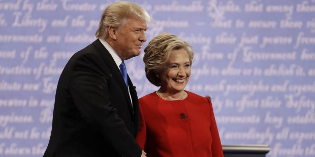 Democratic presidential nominee Hillary Clinton shakes hands with Republican presidential nominee D...