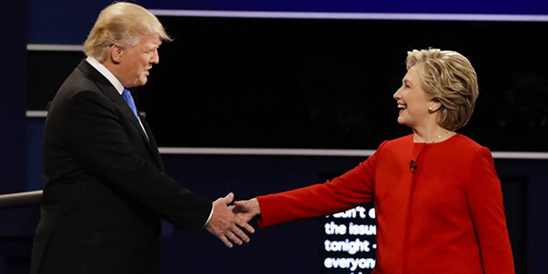 Republican presidential nominee Donald Trump and Democratic presidential nominee Hillary Clinton sh...