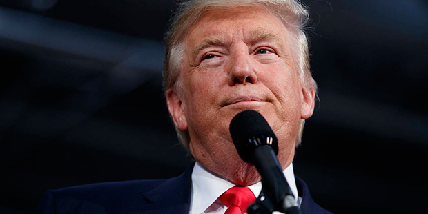 Republican presidential candidate Donald Trump speaks during a campaign rally, Monday, Oct. 10, 201...