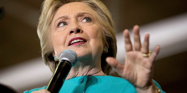 Democratic presidential nominee Hillary Clinton watches as Republican presidential nominee Donald T...