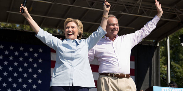 Democratic presidential candidate Hillary Clinton, accompanied by Democratic vice presidential cand...