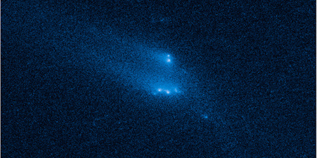 (AP Photo/NASA, ESA, UCLA, D. Jewitt)...