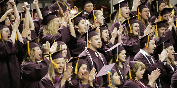 Arizona State University students celebrate in this spring 2006 graduation photo. A new report said...