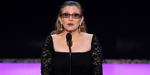 FILE - In this Sunday, Jan. 25, 2015 file photo, Carrie Fisher presents the life achievement award ...