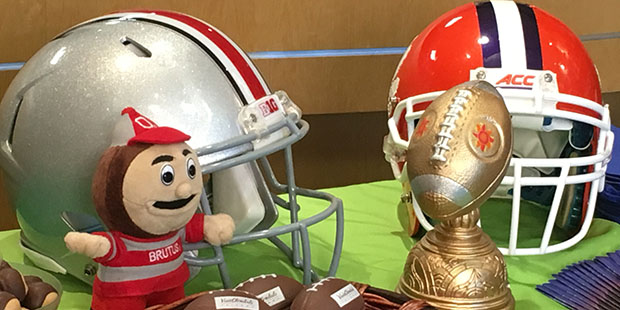 A display at the Glendale Convention and Visitor's Bureau featuring the team helmets from Ohio Stat...