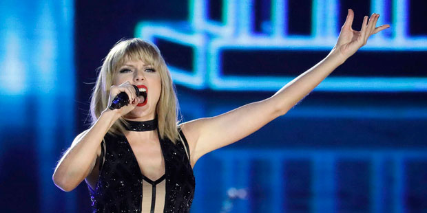 Taylor Swift performs on the eve of the Formula One U.S. Grand Prix auto race at Circuit of the Ame...