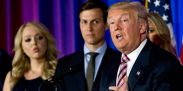 Republican presidential candidate Donald Trump is joined by his daughter Tiffany, left, and son-in-...