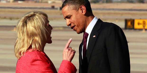 FILE - In this Jan. 25, 2012 file photo, Arizona Gov. Jan Brewer points during an intense conversat...