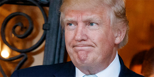 President-elect Donald Trump talks to reporters at Mar-a-Lago, Wednesday, Dec. 28, 2016, in Palm Be...