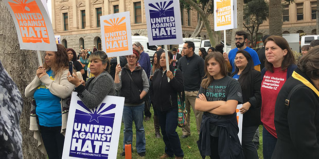 About 200 people gathered outside of the Arizona State Capitol in their United Against Hate coaliti...