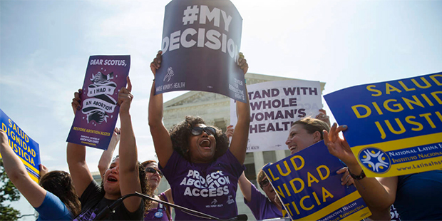 This June 27, 2016 file photo pro-abortion rights activists celebrate during a rally at the Supreme...