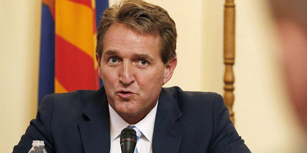 FILE - In this Nov. 23, 2015, file photo, Sen. Jeff Flake, left, R-Ariz., speaks during a field hea...
