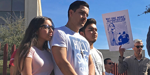 In this Thursday Feb. 9, 2017, photo, the family of Guadalupe Garcia de Rayos stands behind her att...