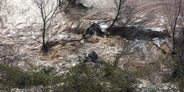 The nearly submerged car, located in the top portion of the photo, is shown. (Yavapai County Sherif...