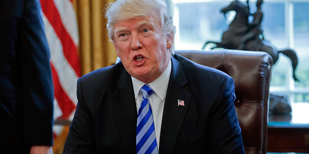 President Donald Trump talks about the health care overhaul bill, Friday, March 24, 2017, in the Ov...