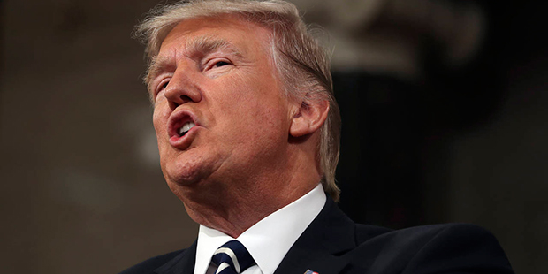 President Donald Trump addresses a joint session of Congress on Capitol Hill in Washington, Tuesday...