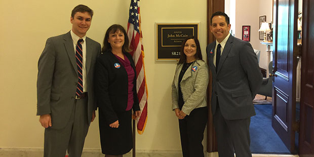 Senator John McCain aide Luke Esper (left) met with Arizona school principals Denise Johnson, Steph...