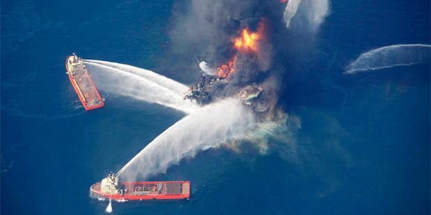 In this April 21, 2010, aerial file photo, the Deepwater Horizon oil rig burns in the Gulf of Mexic...