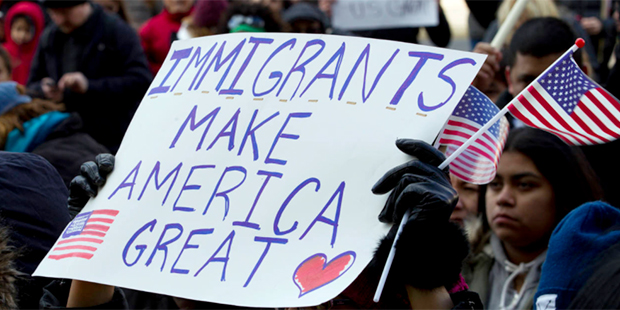 Supporters of immigrants' rights march in downtown Washington during an immigration protest Thursda...
