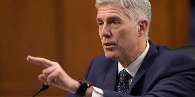 FILE - In this March 22, 2017 file photo, Supreme Court Justice nominee Neil Gorsuch testifies on C...