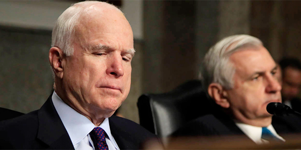 Senate Armed Services Committee Chairman Sen. John McCain of Ariz., left, and the committee's ranki...