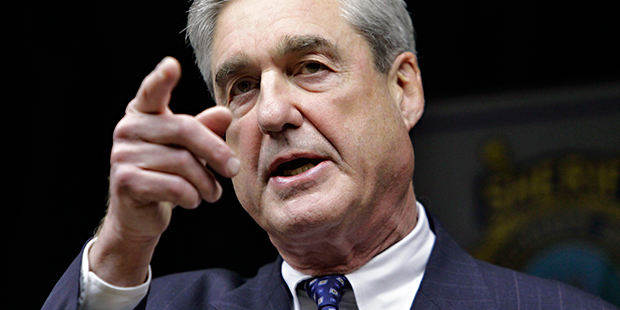 FILE - In this Jan. 9, 2011, file photo, FBI Director Robert S. Mueller III speaks in Tucson, Ariz....