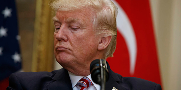 President Donald Trump listens as Turkish President Recep Tayyip Erdogan speaks in the Roosevelt Ro...