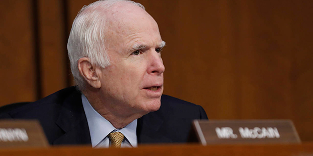 Sen. John McCain, R-Ariz., questions former FBI Director James Comey during a Senate Intelligence C...