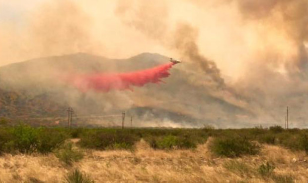 (National Wildfire Coordinating Group Photo)...