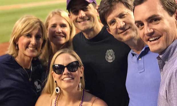 U.S. Rep. Kyrsten Sinema of Arizona (bottom, in sunglasses) poses with House Speaker Paul Ryan (mid...
