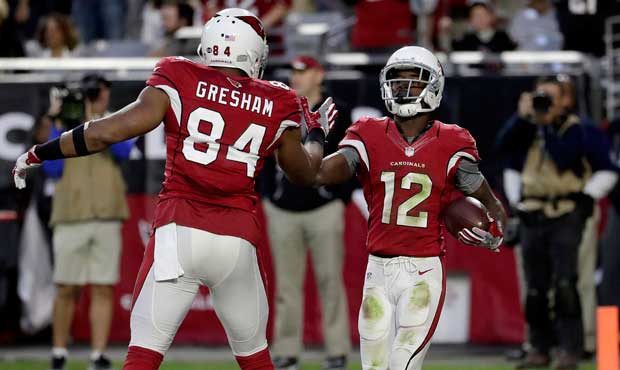 Arizona Cardinals fans cheer during the first half of an NFL  football game against the Cincinnati ...