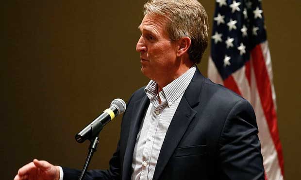 FILE - In this May 30, 2017, file photo, Sen. Jeff Flake, R-Ariz., speaks to members of the Glendal...