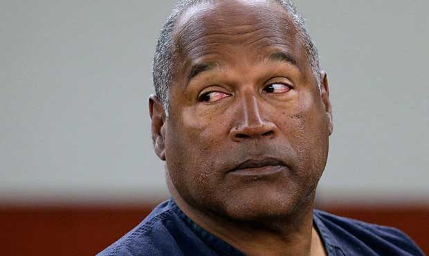 FILE - In this May 15, 2013, file photo, O.J. Simpson returns to the witness stand to testify after...