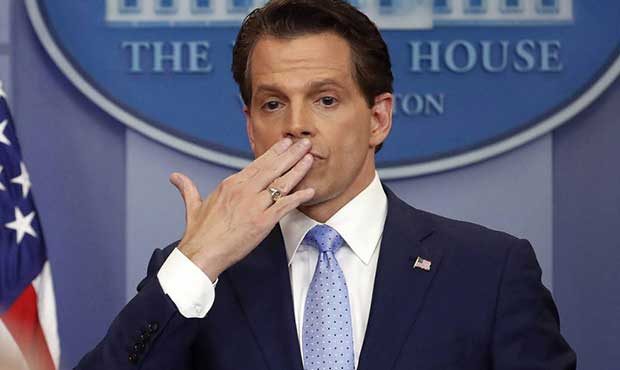 White House communications director Anthony Scaramucci, right, blowing a kiss after answering quest...
