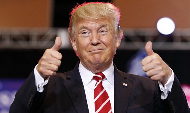 President Donald Trump reacts before speaking at a rally at the Phoenix Convention Center, Tuesday,...