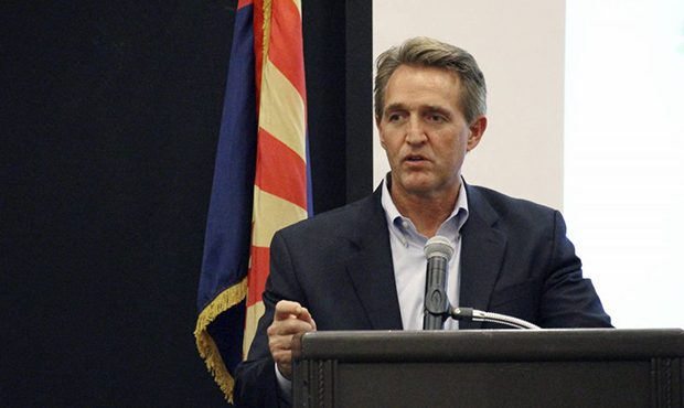 U.S. Sen. Jeff Flake addresses business officials gathered for an event in Prescott, Ariz., Thursda...
