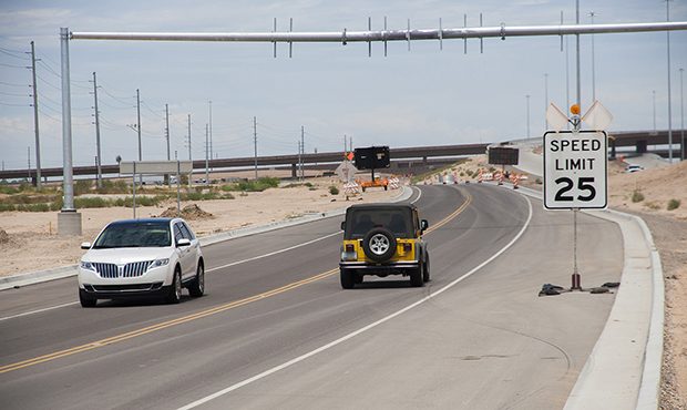 The Cotton Lane/Loop 303 southbound frontage road north of Van Buren Street in Goodyear, Arizona. (...