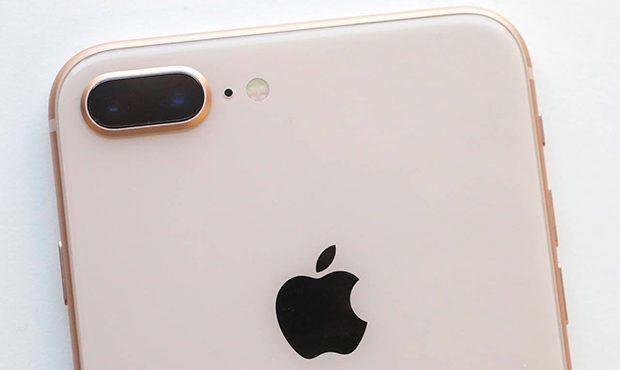 In this Sept. 15, 2017, photo, the camera, upper left, of an iPhone 8 Plus is displayed in New York...