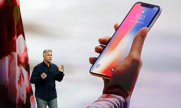 Phil Schiller, Apple's senior vice president of worldwide marketing, announces features of the new ...
