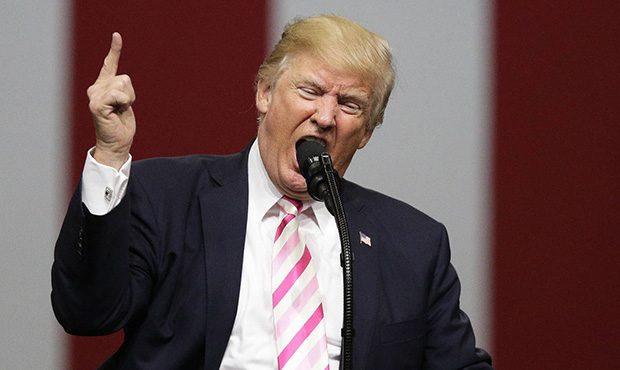 President Donald Trump speaks at a campaign rally in support of Sen. Luther Strange, Friday, Sept. ...