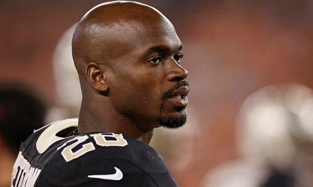 FILE - In this Aug. 10, 2017, file photo, New Orleans Saints running back Adrian Peterson watches d...