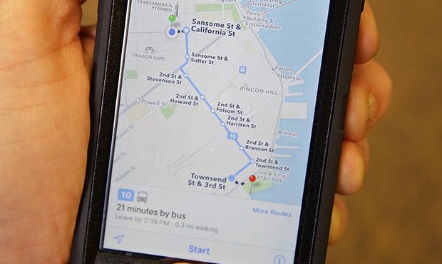 In this photo taken Friday, Dec. 4, 2015, the Apple Maps app displays transit directions in San Fra...