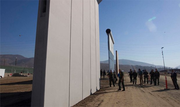 FILE - In this June 13, 2013 file photo, hands from Daniel Zambrano of Tijuana, Mexico, hold on to ...