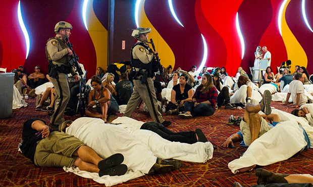 Las Vegas police sweep through a convention center area during a lockdown Monday, Oct. 2, 2017, at ...
