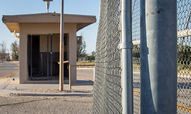 The entrance to the former George Air Force Base has stood empty for decades. The base, at the edge...
