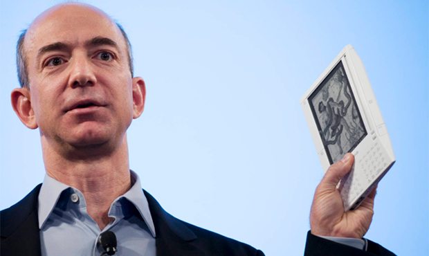 FILE - In this Nov. 19, 2007 file photo, Jeff Bezos, founder and CEO of Amazon, introduces the Kind...