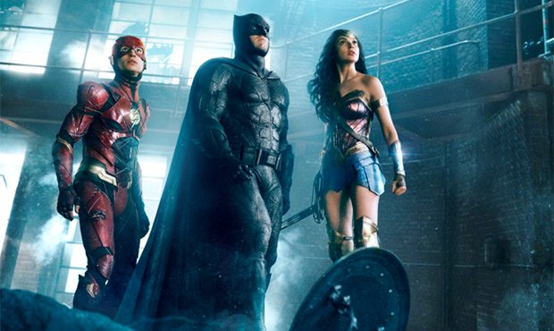 Ezra Miller is The Flash, Ben Affleck is Batman and Gal Gadot is Wonder Woman in "Justice League." ...