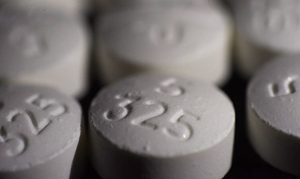 This Tuesday, Aug. 15, 2017 photo shows an arrangement of pills of the opioid oxycodone-acetaminoph...
