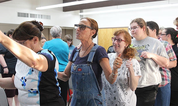 Sam and actors practice at Detour Company Theater. (Photo by Allison Bailey/Cronkite News)...